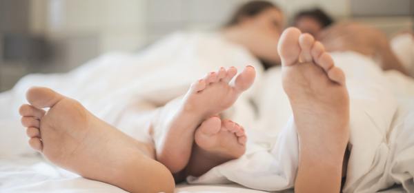Photo by Andrea Piacquadio: https://www.pexels.com/photo/feet-of-couple-in-love-in-bed-3756619/