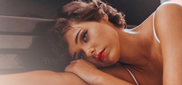Photo by wendel moretti: https://www.pexels.com/photo/woman-leaning-on-piano-1844212/